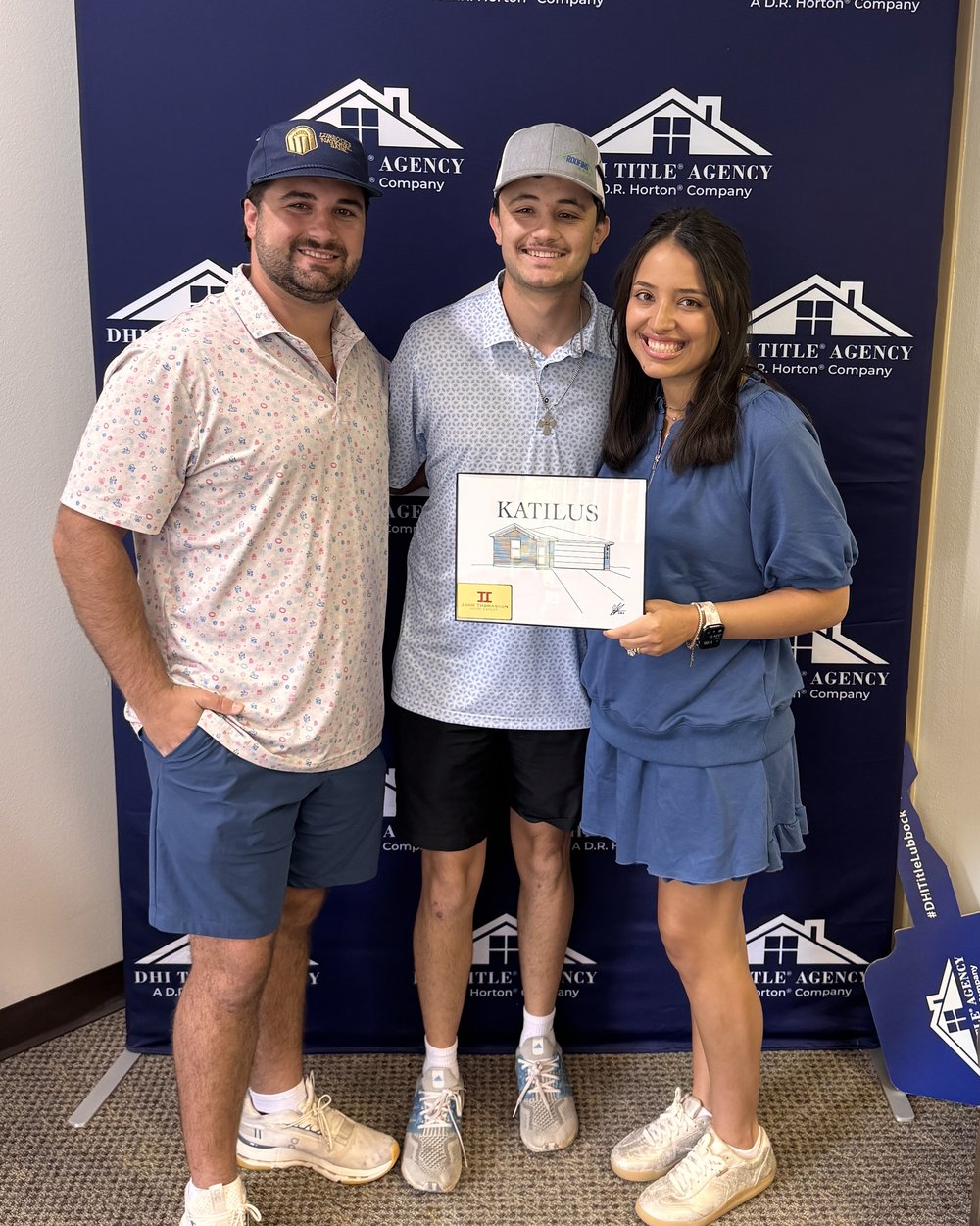 John Thomasson II with clients at their Lubbock home closing